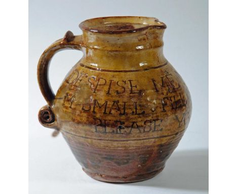 MICHAEL CARDEW (1901-1983), A Winchcombe Pottery stoneware ale jug, c.1940, of ribbed baluster form, the red body slip decora