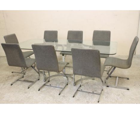 A MERROW ASSOCIATES PART DINING SUITE, 1970's, comprising table of rounded oblong form, the clear glass top raised on a chrom