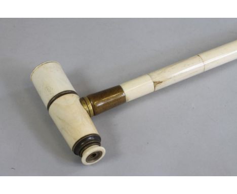 A VICTORIAN SECTIONAL BONE WALKING STICK of plain tapering cylindrical form, the handle unscrewing and as a three draw brass 
