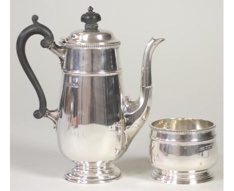 A SILVER HOT MILK JUG AND SUGAR BASIN, makers Mappin & Webb, Sheffield 1925, of rounded tapering cylindrical form with applie