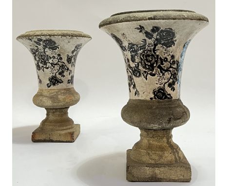 A pair of glazed and transfer printed ceramic or composite garden/architectural trumpet/Campagna form urns with monochromatic