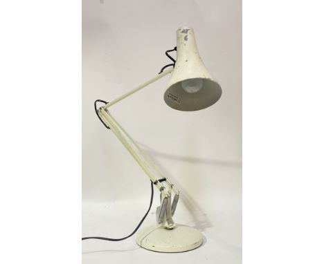 A Vintage anglepoise lamp, with conical shade and on a circular base, stamped 'Anglepoise lighting Ltd. Anglepoise trademark 