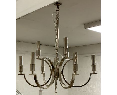 A contemporary chrome plated nine branch pendent light fitting, complete with chain and rose, H70cm.