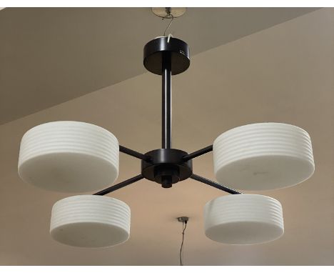 A contemporary ceiling pendent light fitting, four opaline glass shades of ribbed cylindrical form on a cruciform support. H5