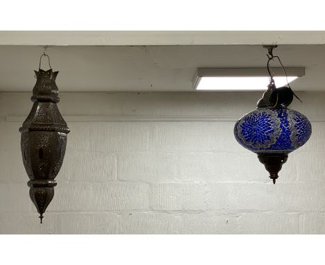 A Moroccan style coloured glass pendent light fitting of compressed spherical form, complete with chain and rose (D33cm) toge