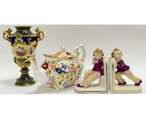 A mixed group of ceramics comprising a Royal Bonn porcelain vase with baroque style decoration depicting roses in gilt rounde