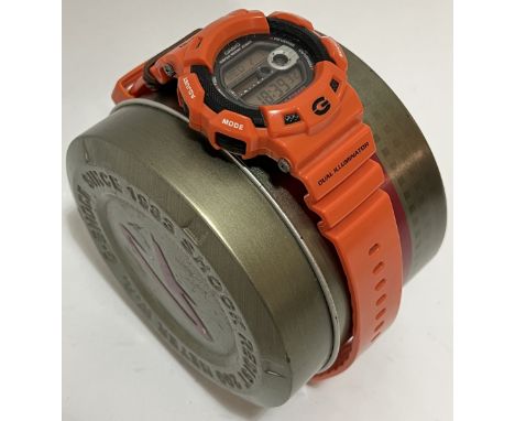 A gents Casio G-Shock Gulfman digital wristwatch, reference G-9100R, with integrated orange strap and titanium case back (ori