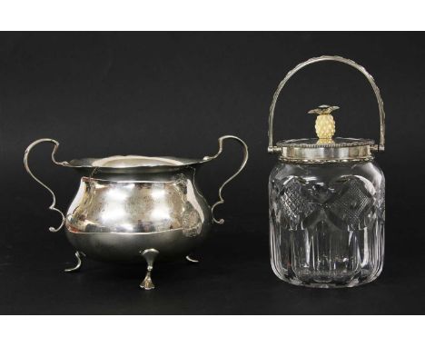 An early 20th century cut glass preserve jar, with silver collar and cover, with pineapple finial, by William Hutton &amp; So