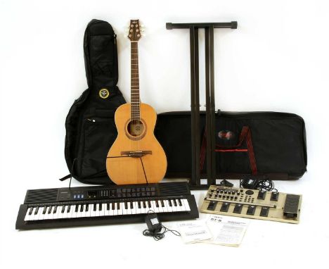 A Lag electro-acoustic guitar, with gig bag, together with a Cassio CTK-530 electric keyboard with power supply, manual and s