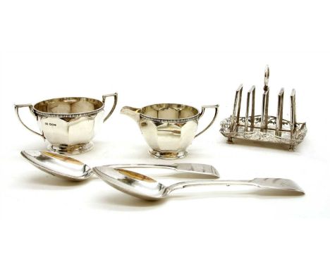 A pair of Victorian silver table spoons, London 1846, together with a silver teaset rack and a matching silver sucrier and cr