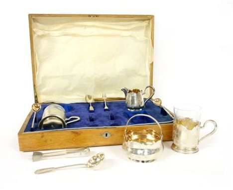 A Russian silver tea set, having engraved foliate detailing in fitted original case