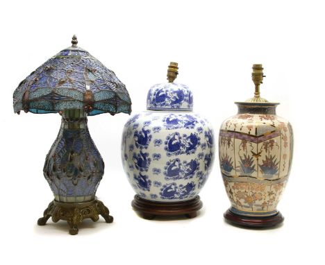 A Japanese Satsuma pottery lamp, with gilt decoration, together with a Chinese blue and white ginger jar lamp and a Tiffany s