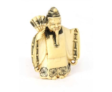 A Japanese ivory netsuke , early 20th century, carved as a man with a fan, 5.5cm high