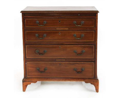 A Georgian and later mahogany bachelor’s chest, having brushing slide above four graduated long drawers on bracket feet , 77c
