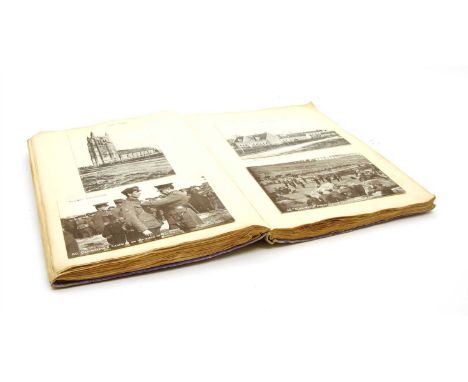 A photography album dating from the First World War, comprising black and white photographs of France, German trenches, etc