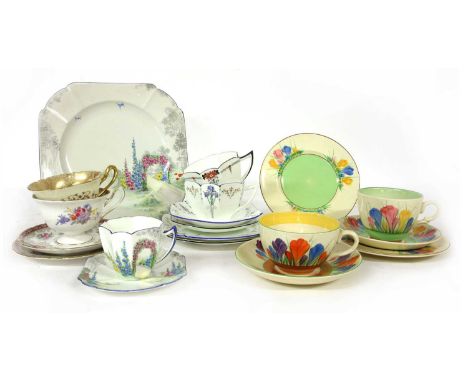An assortment of Shelley porcelain tea and coffee wares, together with two Clarice Cliff Crocus pattern cups and saucers