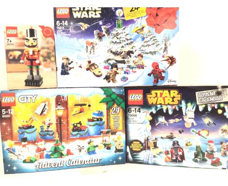 3 Boxed And Sealed Lego Advent Calendars. Lego City #6021. Star Wars #75056 and #75213. And a Nutcracker #40254. (4).