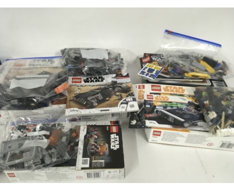 Collection of 4 boxed Lego sets. All Star Wars. 95284 KNIGHTS OF REN TRANSPORT SHIP. 75209 HANS SOLO LANDSPEEDER. 75258 ANAKI