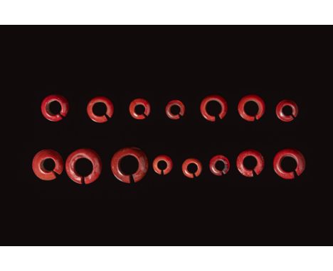Late Period to Ptolemaic Period, Ca. 664 - 30 BC. A group of 15 penannular rings of varying diameter and thickness, each form