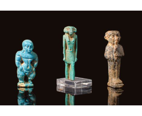 New Kingdom to Ptolemaic Period, Ca. 1550 - 30 BC. A collection of three amulets. The one on the left is a turquoise-blue fai