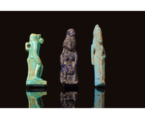 Third Intermediate Period to Late Period, Ca. 1069 - 332 BC. A collection of three amulets. The one on the left is a faience 