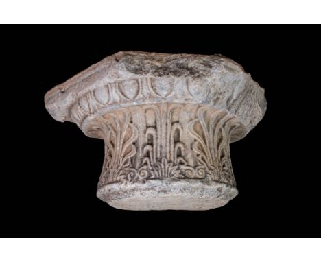 Ca. AD 1 - 50 .A column capital carved in Proconnesian marble. The lower register is adorned with alternating open and closed