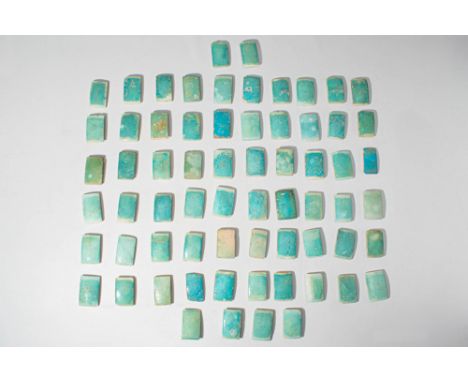 Old Kingdom, Ca. 2686 - 2181 BC. A collection of 66 rectangular faience tiles, each with a slightly convex upper face, coated