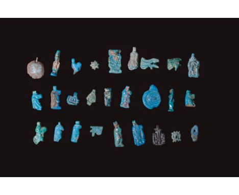 New Kingdom to Late Period, Ca. 1550 - 332 BC. A collection of 27 faience pendants and amulets, including representations of 