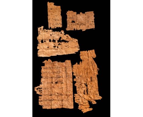 Ca. 30 BC - AD 400.A collection of papyri inscribed with demotic text in black ink. Demotic was used specifically for writing