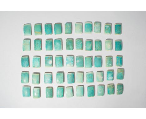 Old Kingdom, Ca. 2686 - 2181 BC. A collection of 50 rectangular faience tiles, each with a slightly convex upper face, coated
