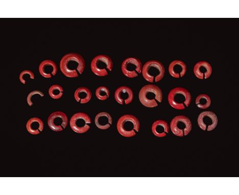 Late Period to Ptolemaic Period, Ca. 664 - 30 BC. A group of 24 penannular rings of varying diameter and thickness, each form