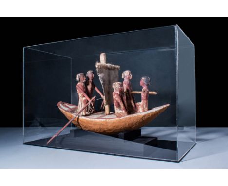 Middle Kingdom, Ca. 2055 - 1790 BC.An Egyptian Middle Kingdom wooden boat model made from sycamore wood. Found in tombs, mode