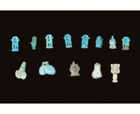 New Kingdom to Third Intermediate Period, Ca. 1550 - 664 BC. A collection of 13 faience amulets. The upper row includes sever