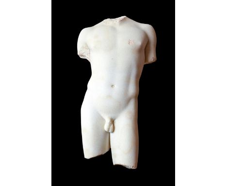 Ca. AD 150. A finely executed marble torso representing the fragmentary figure of a youthful male, most likely an ephebe. It 