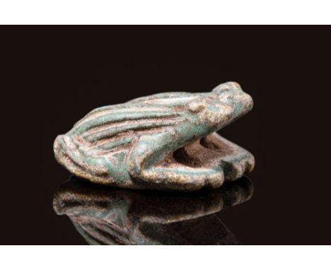 Third Intermediate Period, Ca. 1069 - 664 BC. A green faience amulet in the form of two frogs placed side-to-side, each rende
