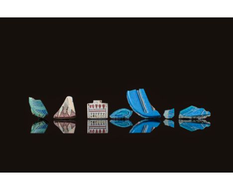 New Kingdom to Late Period, Ca. 1550 - 332 BC. A collection of seven faience inlays, beginning on the left with a fragmentary