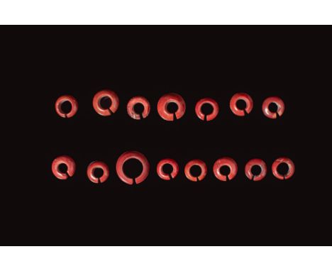 Late Period to Ptolemaic Period, Ca. 664 - 30 BC. A group of 15 penannular rings of varying diameter and thickness, each form