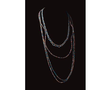 Late Period, Ca. 664 - 332 BC. A collection of four restrung faience and glass bead necklaces, including three single strands
