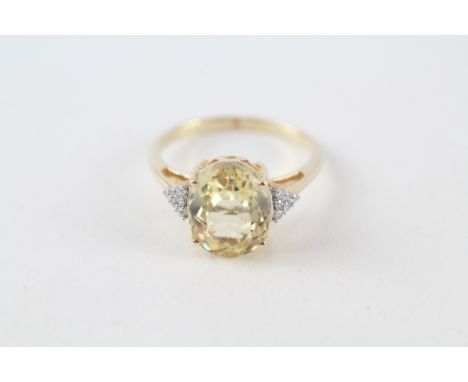 14ct gold oval cut yellow spodumene &amp; diamond ring (3.1g) 