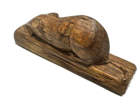 Robert Thompson of Kilburn (1876-1955) Mouseman- a small carved oak signature mouse, 5.8cm long 