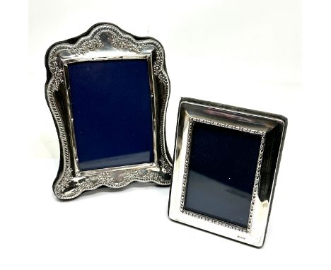 2 vintage silver picture frames largest measurtes approx 16cm by 13cm 