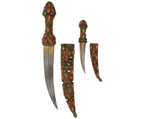 A MATCHED PAIR OF TURKISH OR OTTOMAN JAMBIYA, the first with 14.5cm curved fullered blade signed and decorated in gold koftga