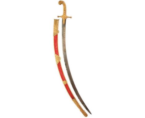 A 19TH CENTURY INDIAN KUTCH SHAMSHIR OR SWORD, 78cm sharply curved blade chiselled with a panel of scrolling foliage and flow