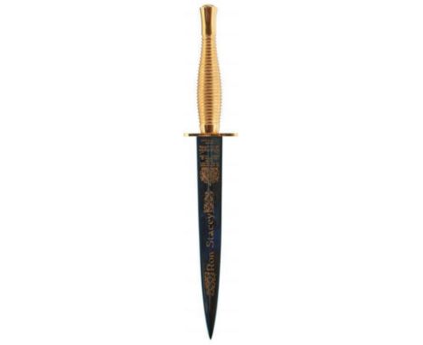 A FAIRBAIRN SYKES WILKINSON SWORD COMMEMORATIVE COMMANDO DAGGER, 17.75cm blued blade etched with the owner's name Ron Stacey 