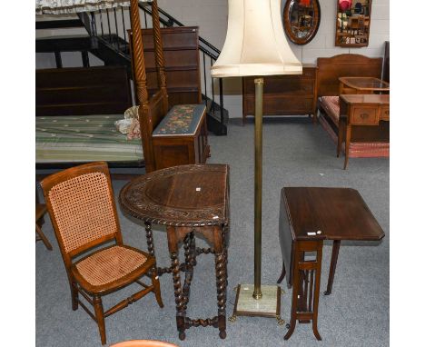 A carved oak drop leaf occasional table on barley twist legs, together with a mahogany Sutherland table and a brass corinthia