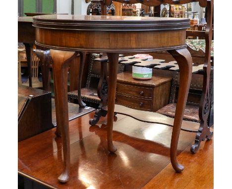 A 1920s oak bureau, 76cm by 34cm by 103cm, together with a burr walnut demi-lune foldover card table, 84cm by 42cm by 76cm (2