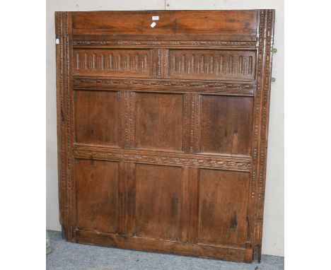 An 18th century carved oak panel/headboard, 133cm by 150cm Condition report: The width of the panel is 133cm and the height i