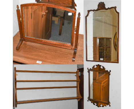 Two 19th century mahogany framed mirrors, two later mahogany dressing table mirrors, and a George III commode (5)