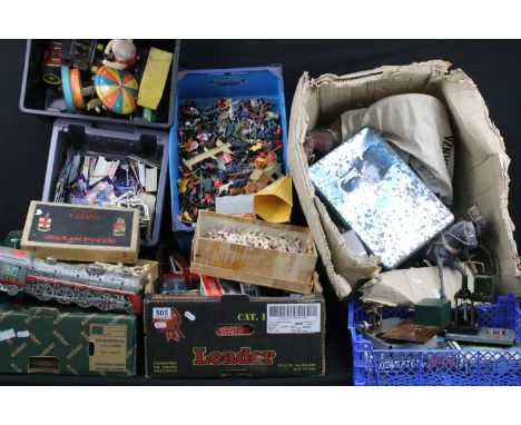 Collection of various toys and games to include tin plate models featuring Overland Choo-Choo Express, saloon car, etc, small
