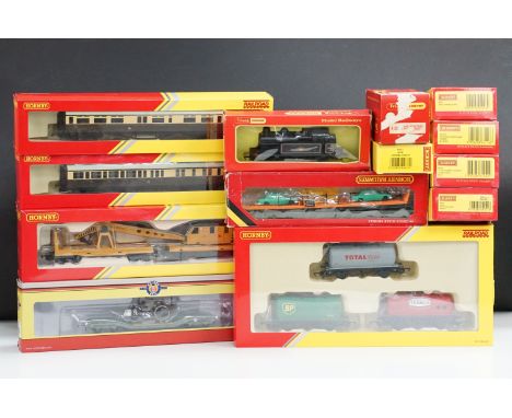 11 Boxed OO gauge items of rolling stock to include 10 x Hornby examples featuring R6891 Triple Fuel Tanker Pack, R6369 Break